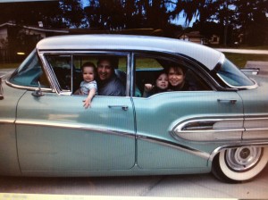 Family in old car