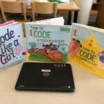 Chromebook computer and 3 books