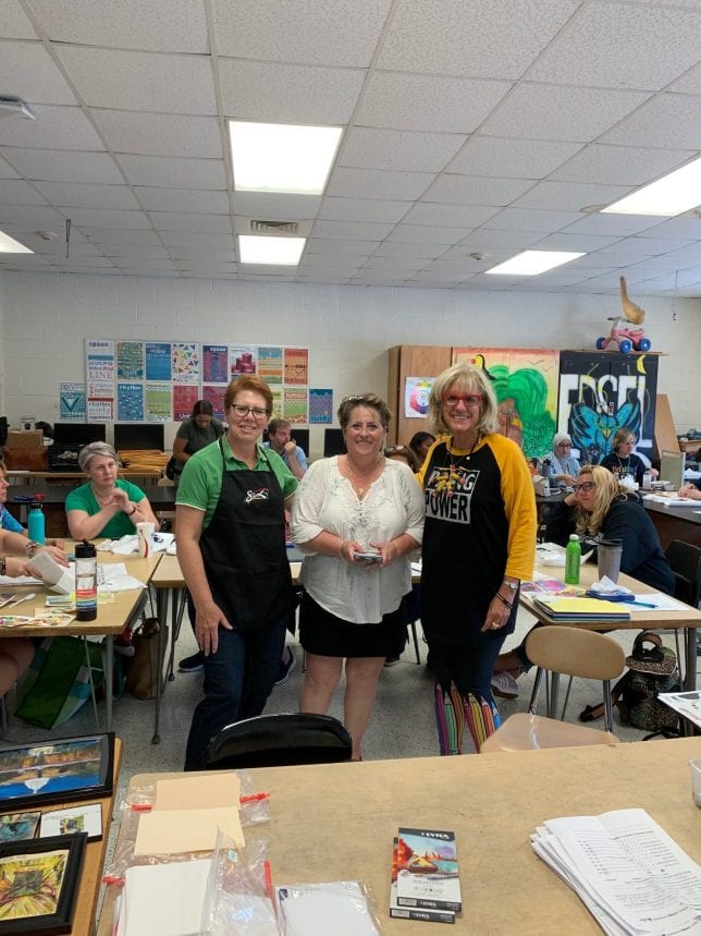 Three guests from Dixon, and School Specialty