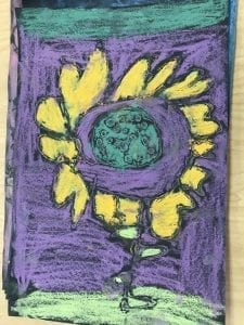 student flower drawing; a purple background, yellow petals, and a dark green center on the flower