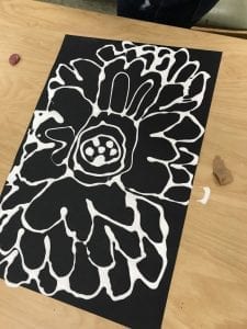 flower drawing with every line traced with white glue