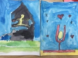 two bubble people paintings both jumping in the air in the splits