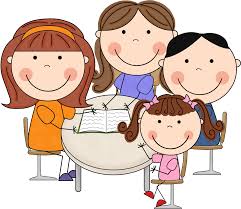 Adults and kids at a table