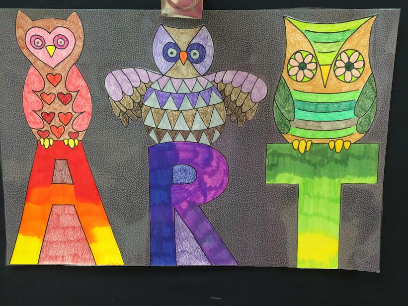 drawing of owls sitting on top of letters A, R, T
