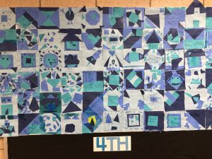 Fourth grade paper quilt squares using blue construction paper
