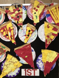 paper pizza slices made by 1st grade students