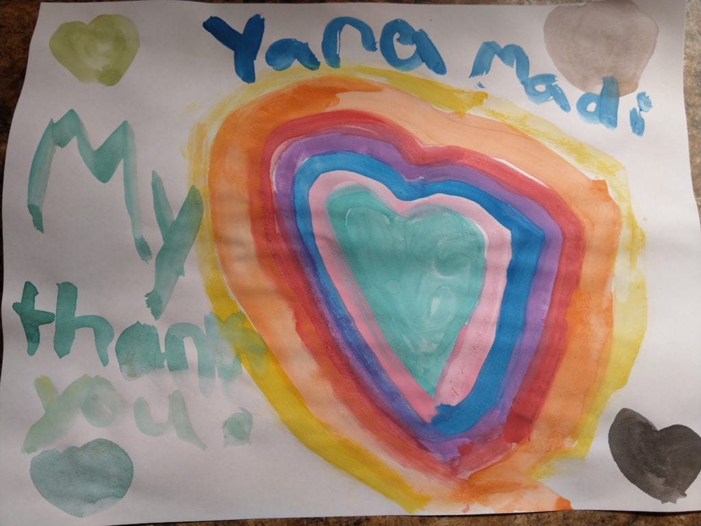 watercolor painting of a heart with rainbow colors and a thank you message