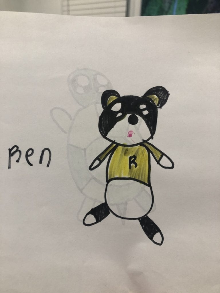 Drawing of a teddy bear wearing a yellow shirt