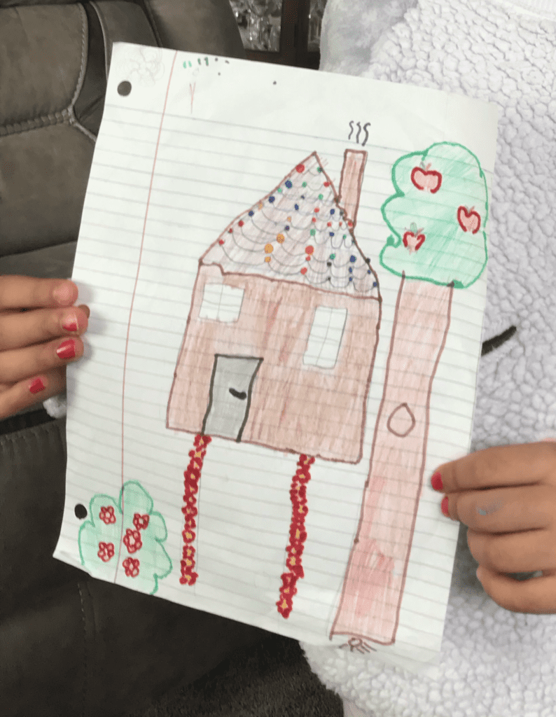 house drawing with tall tree and flowers making a pathway