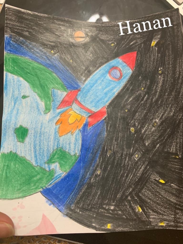 drawing of a rocket flying above the earth