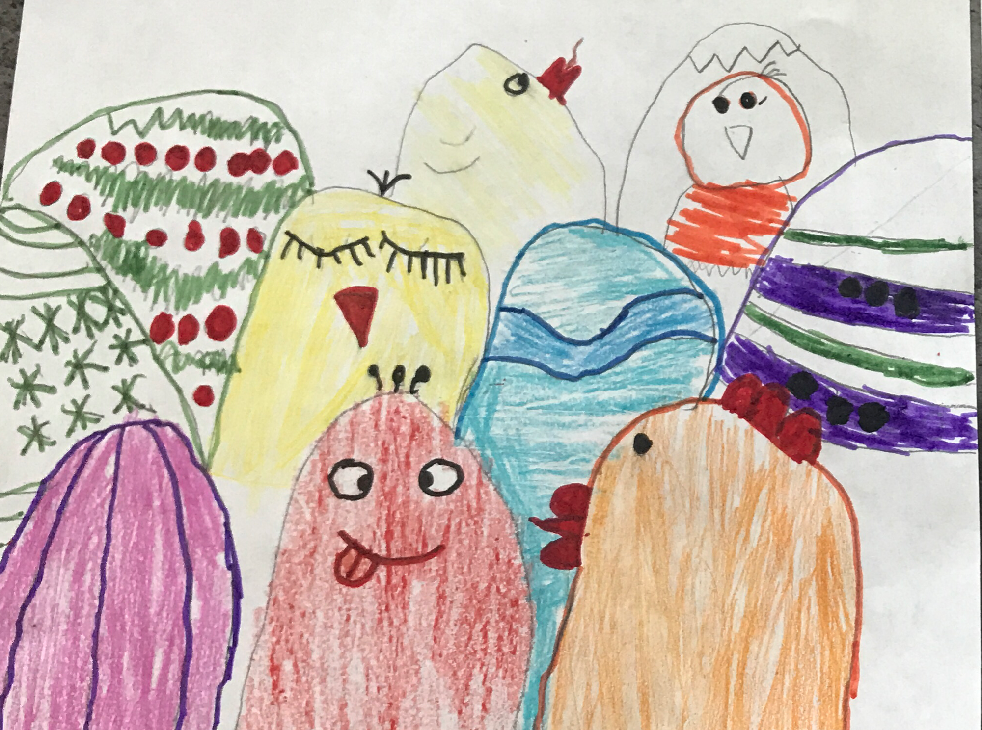 drawing of eggs with patterns, lines, shapes, and faces on them