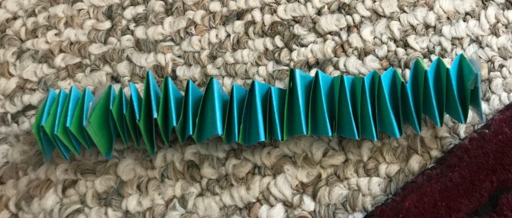 folded paper made into a slinky