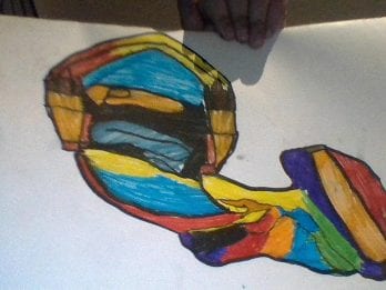 drawing of a whale with many colors for the body