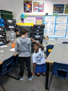 Student measuring body.