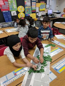 Students making sand