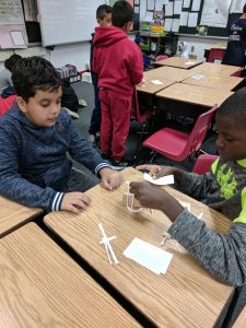 Students making a space lander
