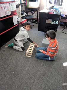 Students building bridges.