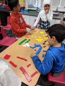 Students sorting legos.