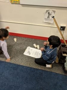 Students using the wrecking ball