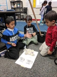 Students using the wrecking ball
