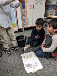 Students using the wrecking ball.