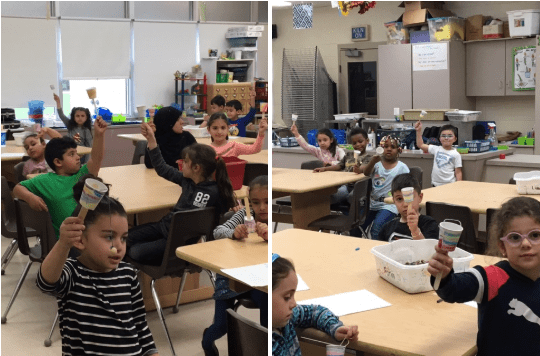 students show off their ball and cup games in the art room