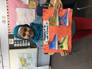 Student showing her project