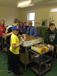 Our wonderful volunteers this week at Blessings in a Backpack packing!
