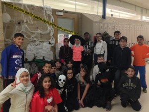 In front of our spooky Halloween Door!