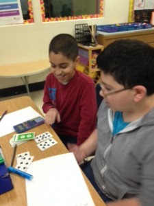 We used cards, calculators and notes to practice using exponents.