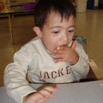 Student eating pancakes