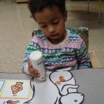 Student using a bingo marker