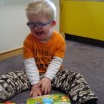 Student playing with toy