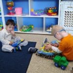 Student playing with toy
