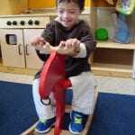 Student playing with toy