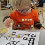 student using bingo marker