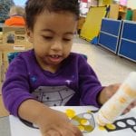 student using bingo marker