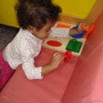 student completing a puzzle