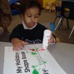 student using bingo markers