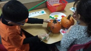 We painted 2D shapes on pumpkins!
