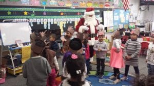 Santa is dancing and singing with us! 