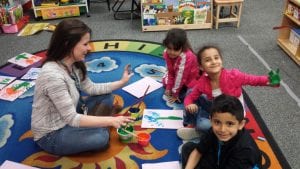 We used our hands and paint to create beautiful flowers!