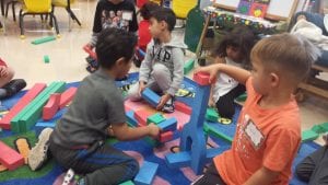 We are playing with blocks! We are learning to share!