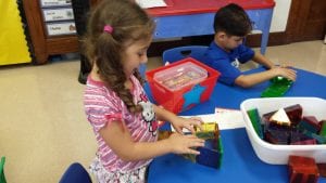 We are building strengthening our fine motor muscles in our hands as well as our hand eye coordination as we work with our table toys.