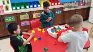 We are building strengthening our fine motor muscles in our hands as well as our hand eye coordination as we work with our table toys.