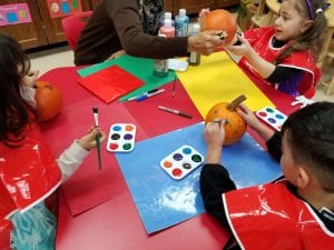 We are painting 2D shapes on our pumpkins!