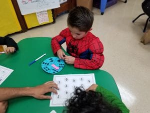  We are matching the quantity with the number during Spider Math Spin!