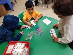 We are practicing showing the quantity for a number using a ten frame.