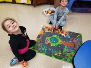We are using our imagination as we play with our friends!