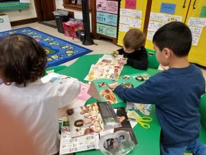 We are practicing finding pictures of things we need to live in magazines!!!